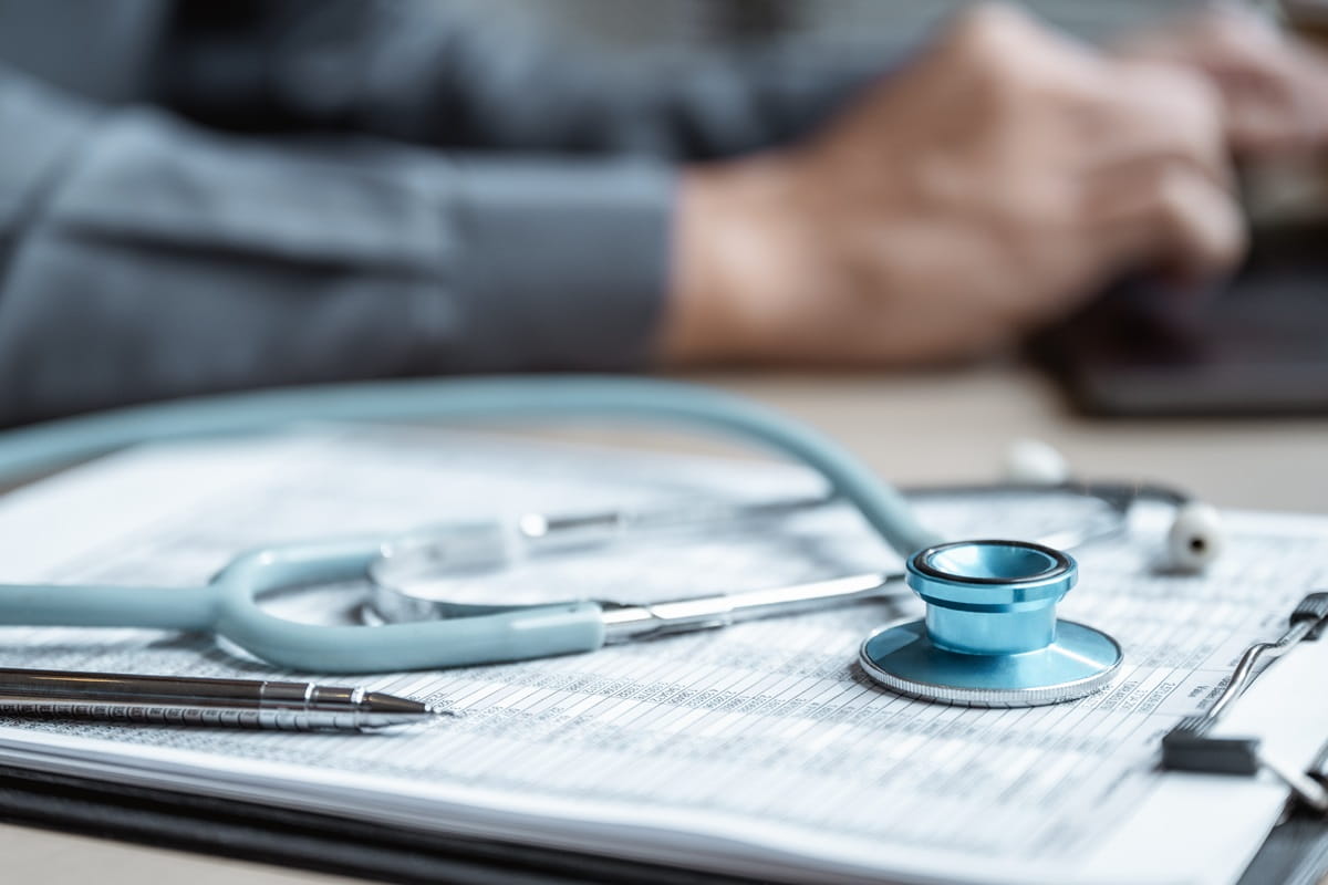 Medical papers doctors filling the form