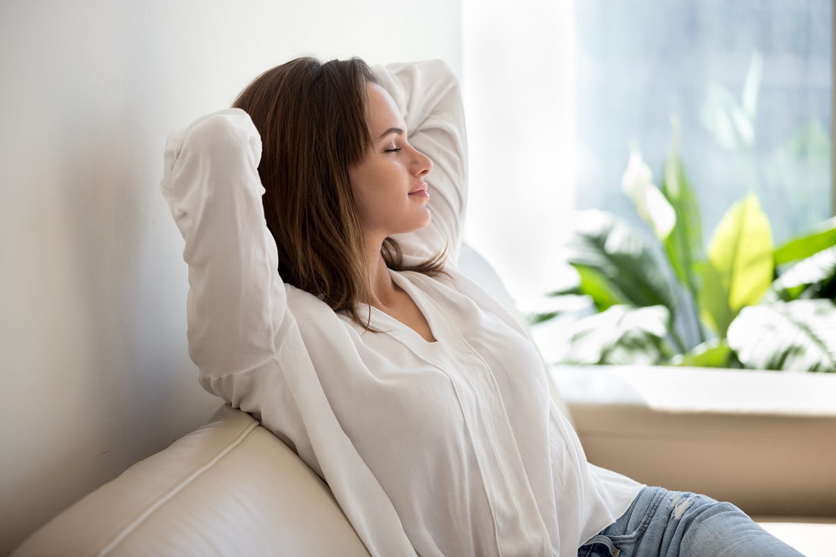 Woman relaxing mental health_1200