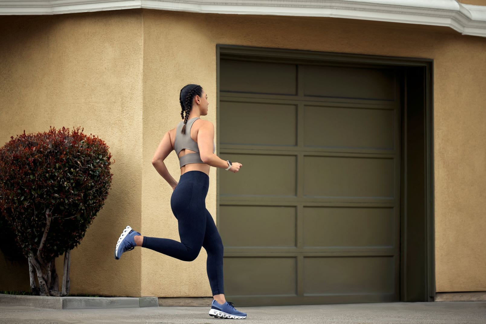 Person running with Garmin