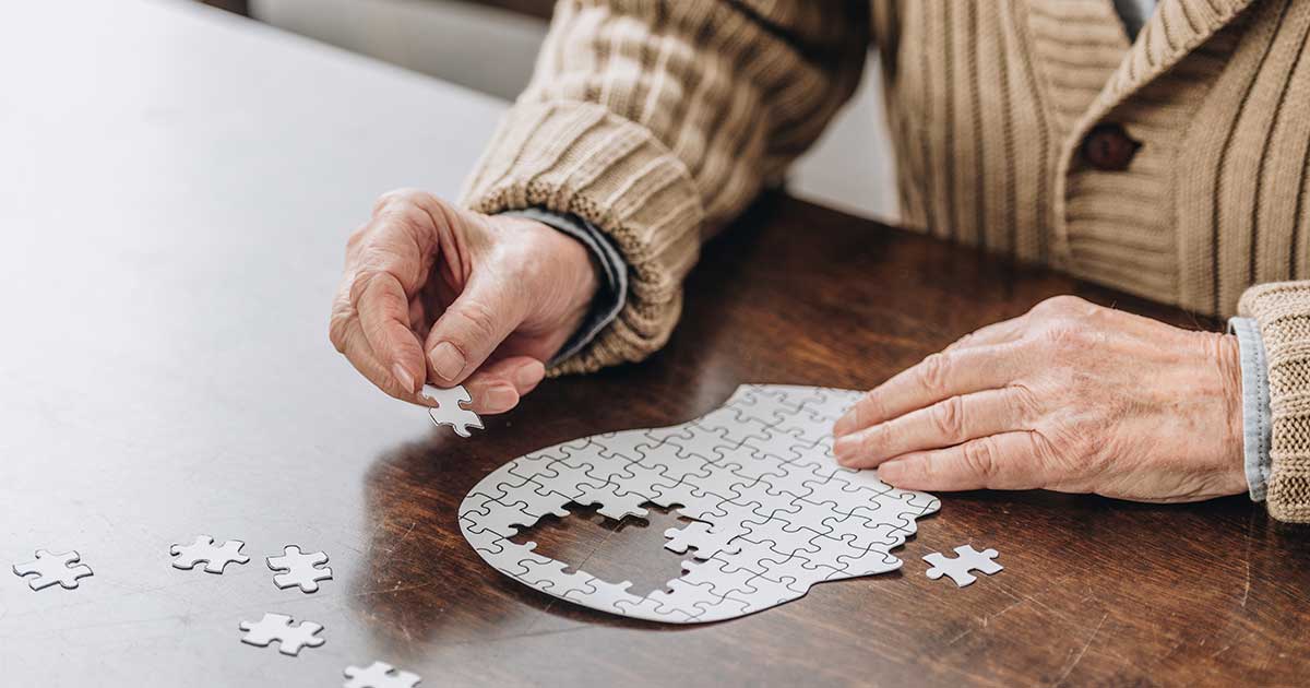 Person completing a puzzle