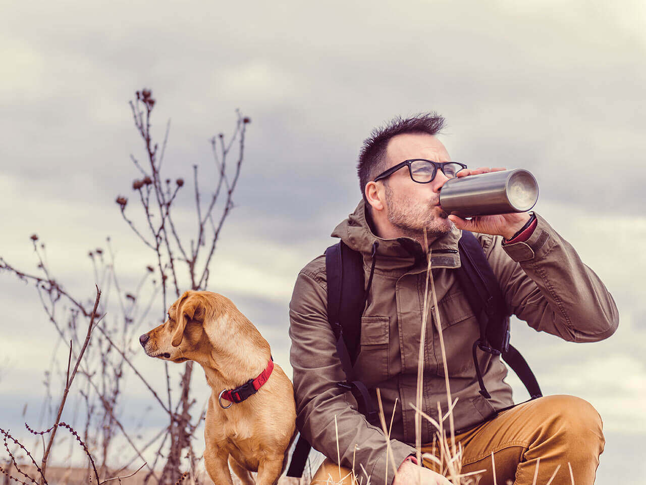 man walking dog