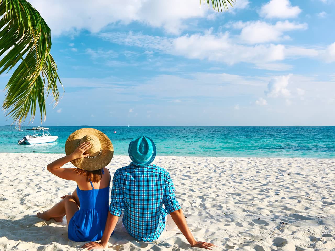 Couple sitting on beach