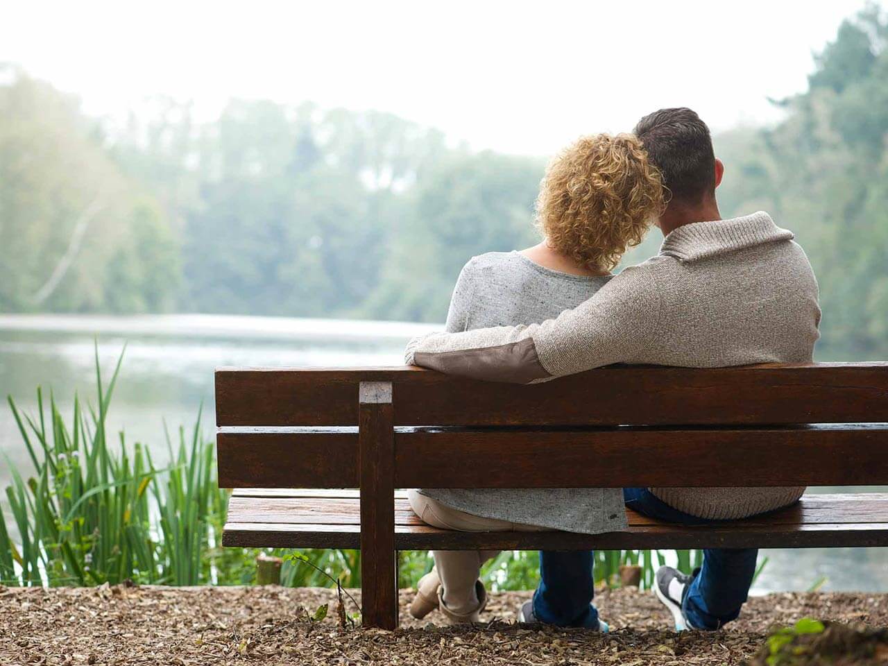 couple sitting on bench