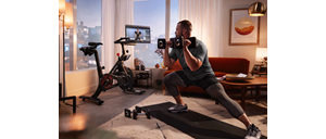 man working out with peloton equipment 