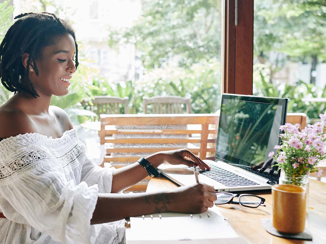 Young woman on laptop at home