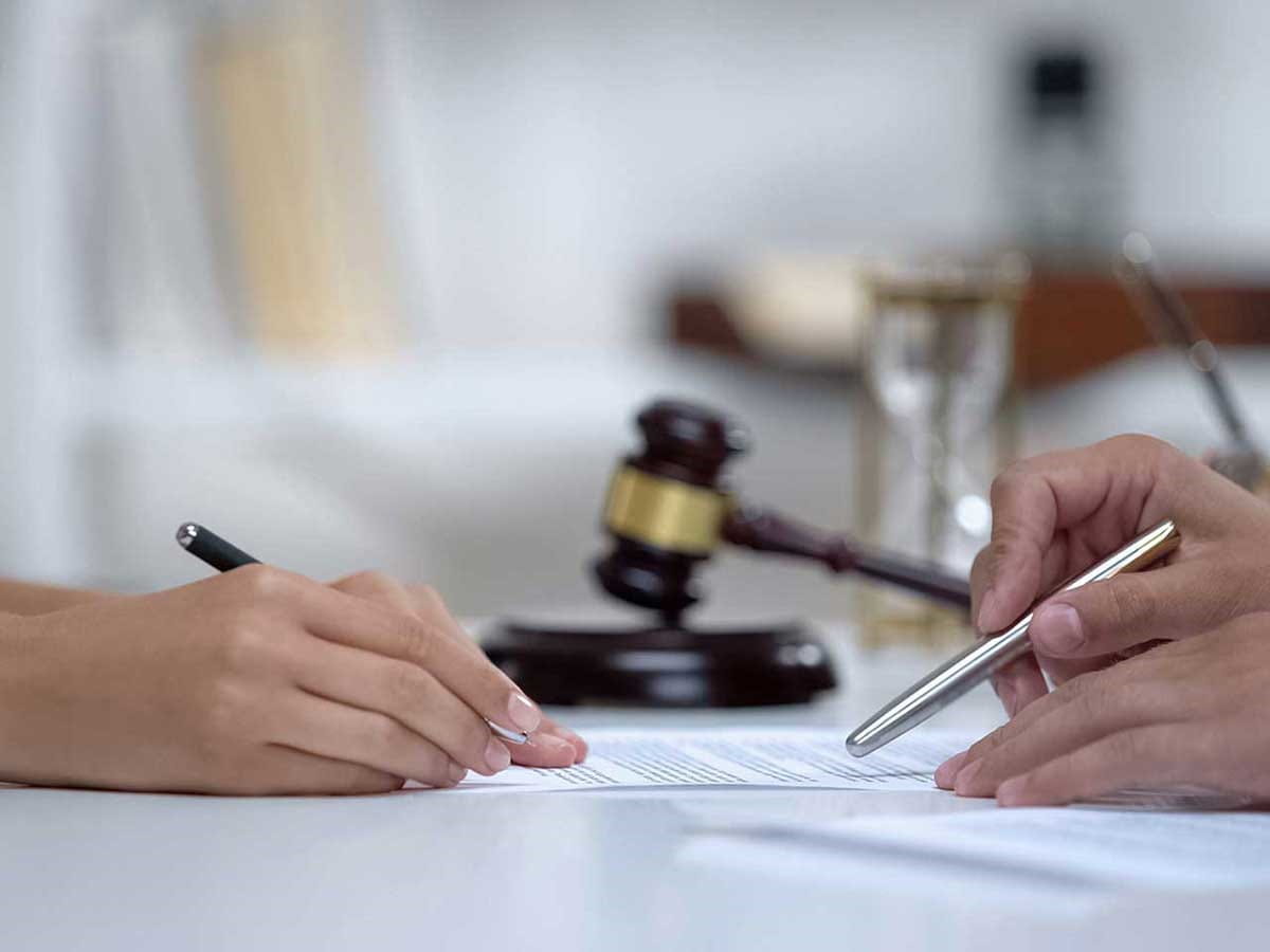 People discussing paperwork