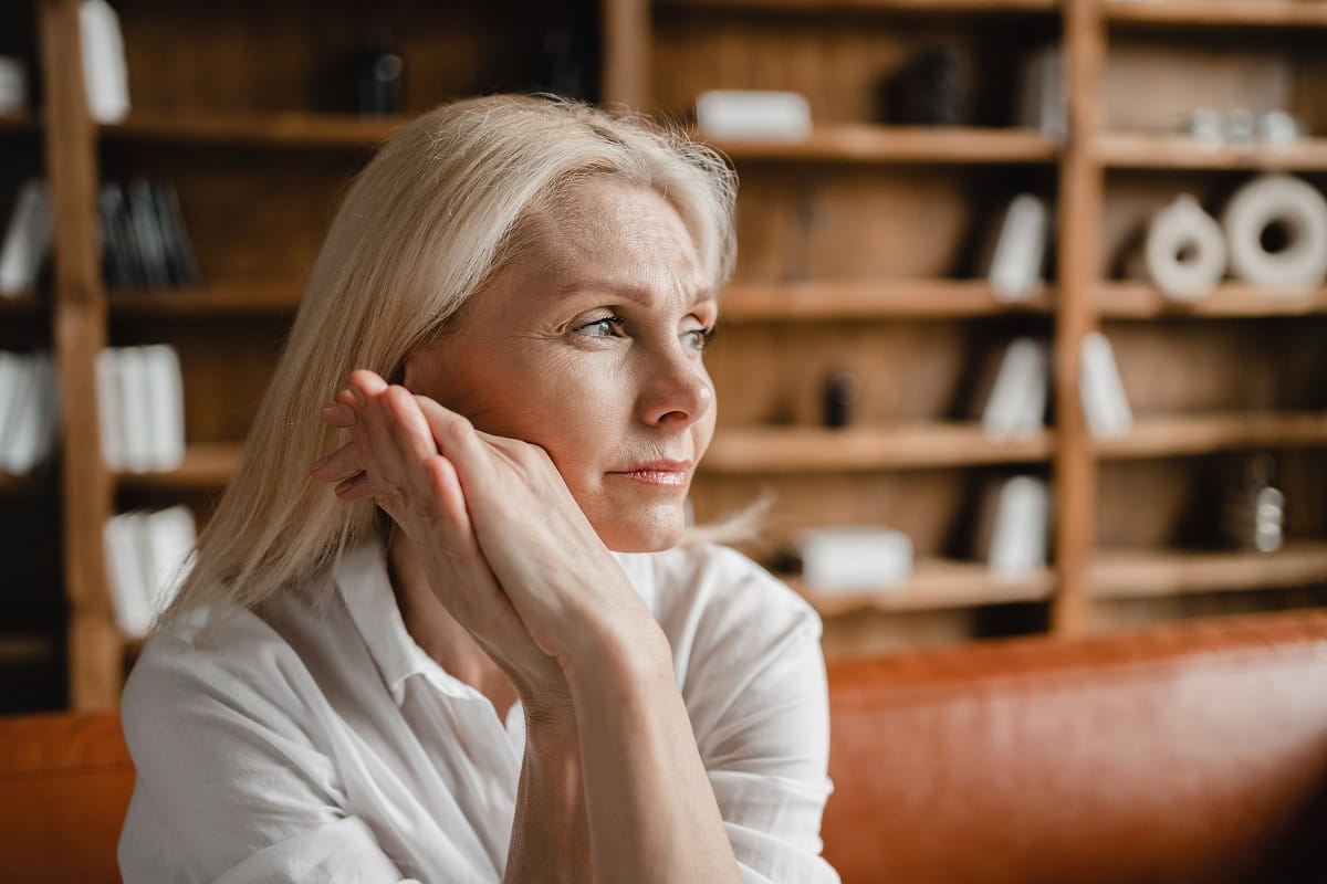older woman looking in distance mental health menopause