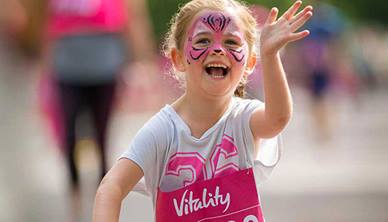 Girl with facepaint running