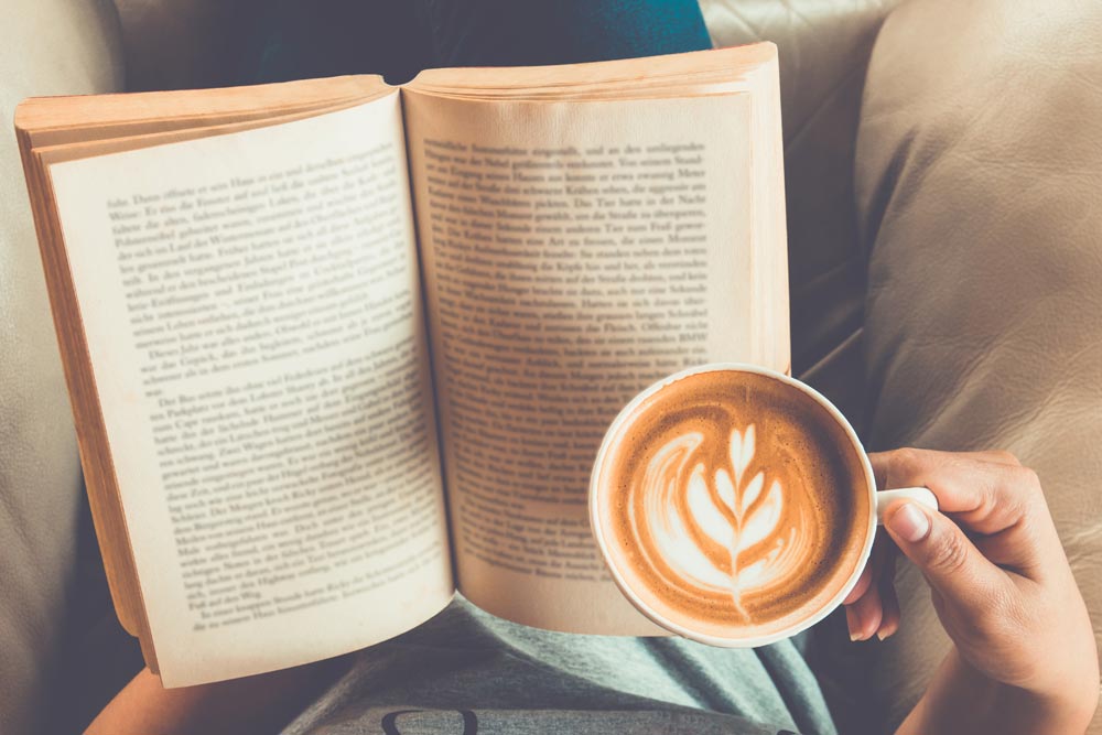Book and coffee wellbeing