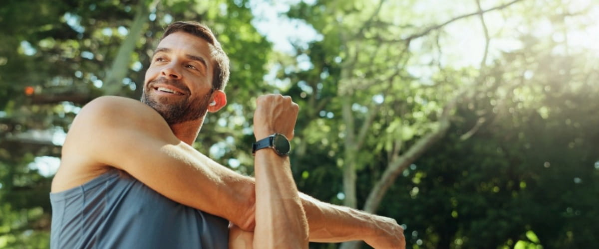 man-stretching-outside-in-nature