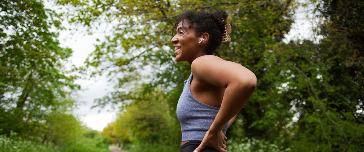 women exercising outside to support her mental health