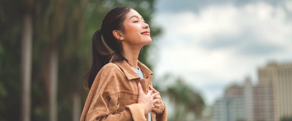 woman-smiling-among-nature