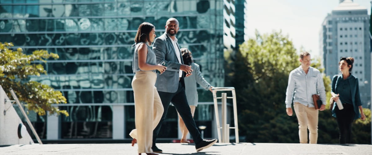 two-employees-on-a-walking-meeting