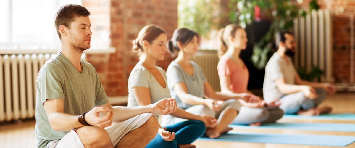 groupofemployeesattendingyogaclassjpeg