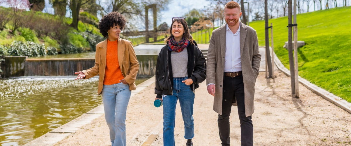 groupofemployeeswalkinginparktogetherjpeg
