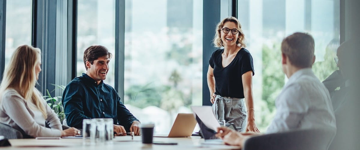 Young people in the office having a meeting_1200x500