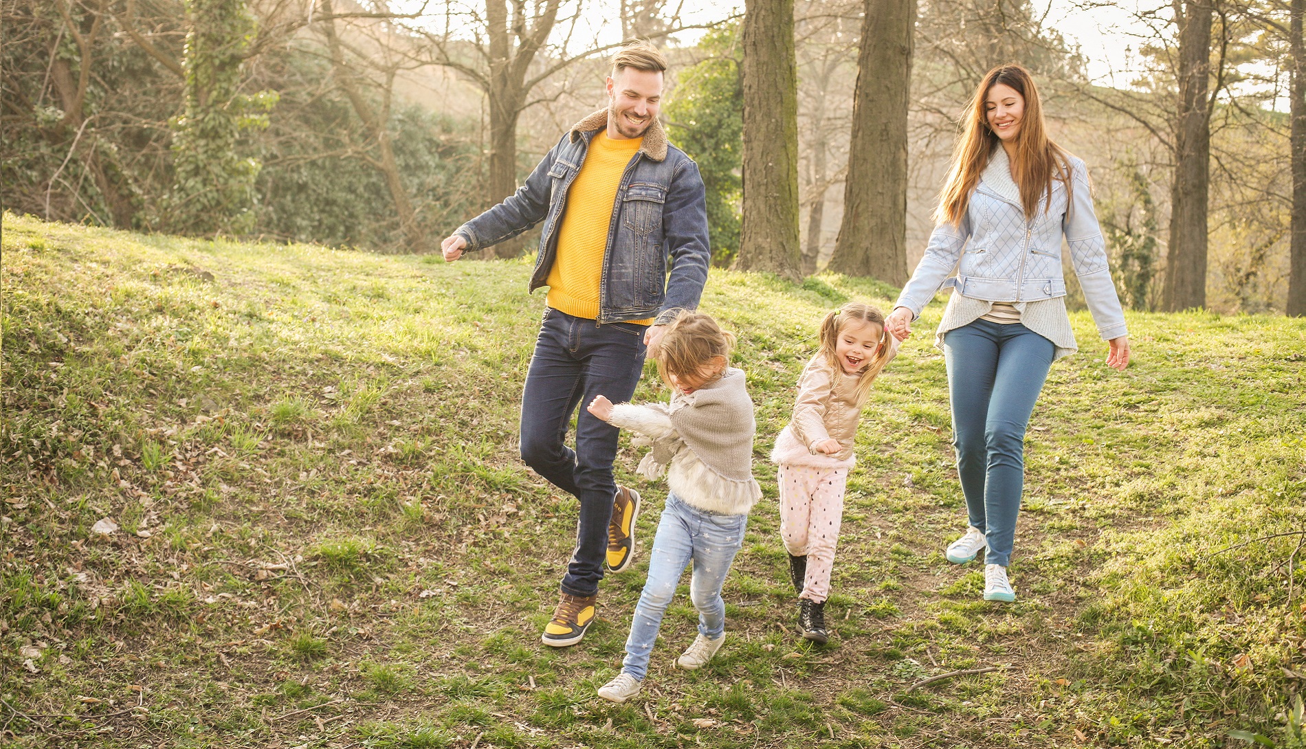 Family walking in woods