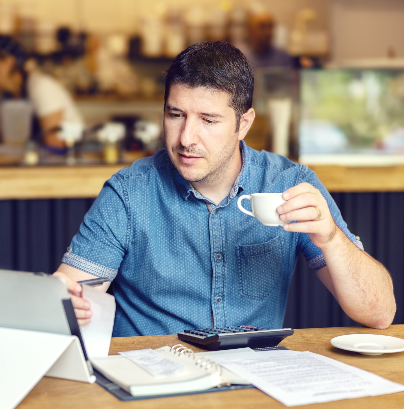 man working in the coffee shop