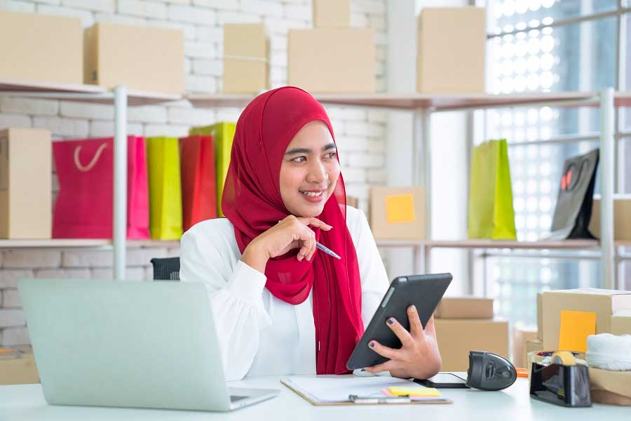Woman in the office on the phone