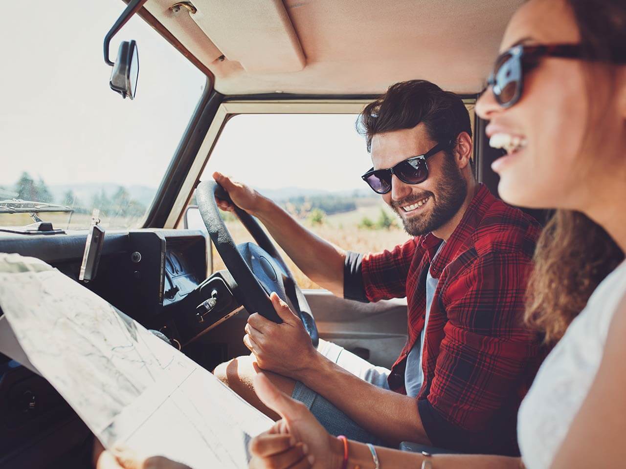 couple navigating in car