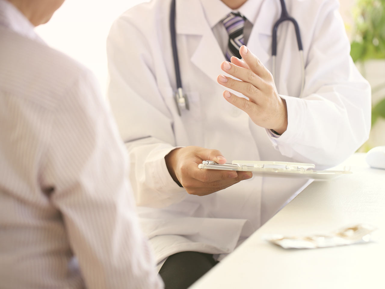 doctor talking to patient