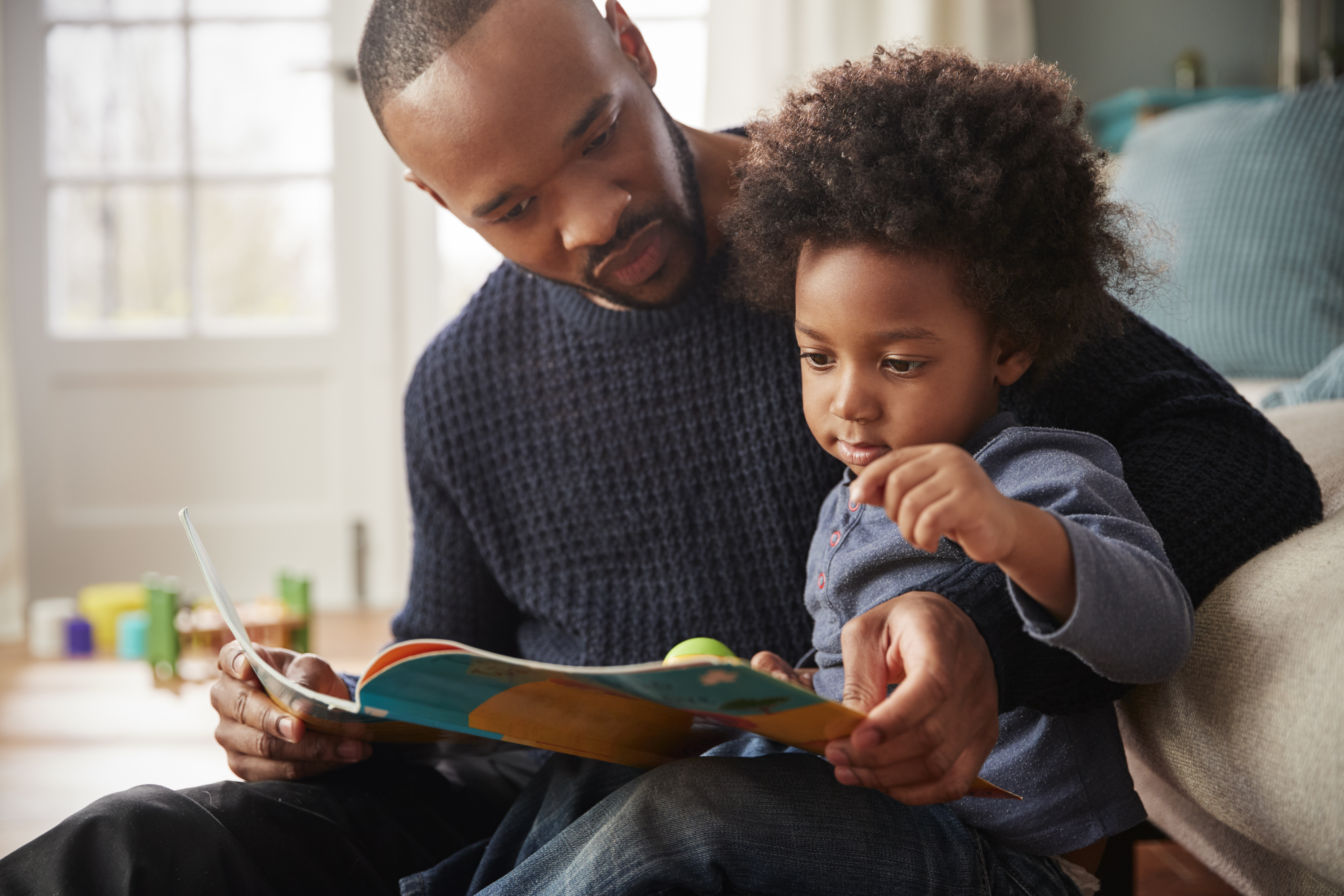 father and son read