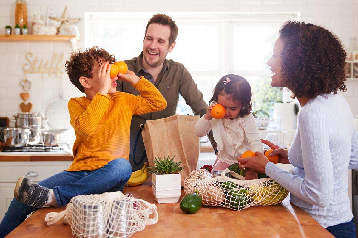 Family laughing at home